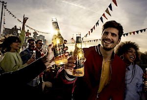 Authentic photography by Florian Geiss, a Horton-Stephens client, captures lifestyle images of people having fun in outdoor travel destinations with drinks.