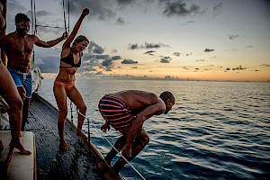 Florian Geiss, a London photographer with Horton-Stephens, captures lifestyle images of people having fun outdoors, drinking natural and authentic drinks.photography agency london. Friends swimming.