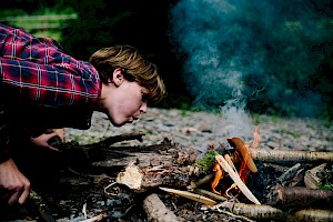 This colour photo shows wild camping by James Bowden, UK  photographer, represented by Horton-Stephens photographer’s agents specialises in natural and authentic  lifestyle outdoors nature photographic images.