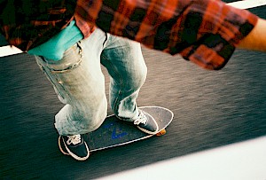 This colour photo shows a sport skateboarder by James Bowden, UK  photographer, represented by Horton-Stephens photographer’s agents specialises in natural and authentic  lifestyle outdoors nature photographic images.