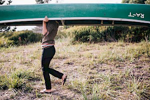 This colour photo shows a canoe adventure by James Bowden, UK  photographer, represented by Horton-Stephens photographer’s agents specialises in natural and authentic  lifestyle outdoors nature photographic images.