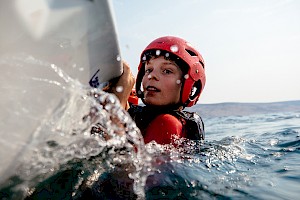 This colour photo shows sailing for an outdoor brand by James Bowden, UK  photographer, represented by Horton-Stephens photographer’s agents specialises in natural and authentic  lifestyle outdoors nature photographic images.