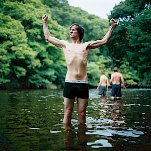 This colour photo shows a comedic lake scene by James Bowden, UK  photographer, represented by Horton-Stephens photographer’s agents specialises in natural and authentic  lifestyle outdoors nature photographic images.