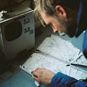 This colour photo shows a walking ordnance map by James Bowden, UK  photographer, represented by Horton-Stephens photographer’s agents specialises in natural and authentic  lifestyle outdoors nature photographic images.