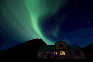 This colour photo shows a northern lights expedition James Bowden, UK  photographer, represented by Horton-Stephens photographer’s agents specialises in natural and authentic  lifestyle outdoors nature photographic images.