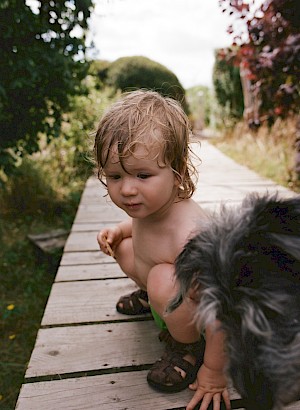 Commercial creative agents Horton-Stephens represent London photographer Megan Eagles, who shoots motion, film and stills for advertising, people, mother, babies, lifestyle, UK and Europe, on location. Close in baby portrait.