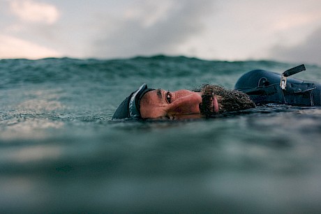 bearded man in water shot by James Bowden top outdoor and lifestyle photographer represented by Horton Stephens agency