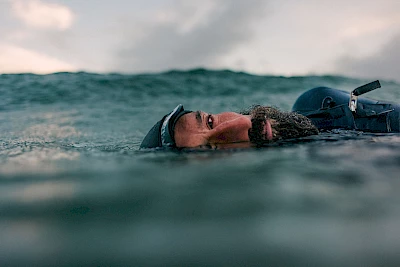 portrait of bearded man in water shot by James Bowden top outdoor photographer represented by Horton Stephens agency